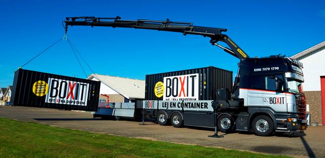 Flyt erhverv med en container Container leveres til flytning